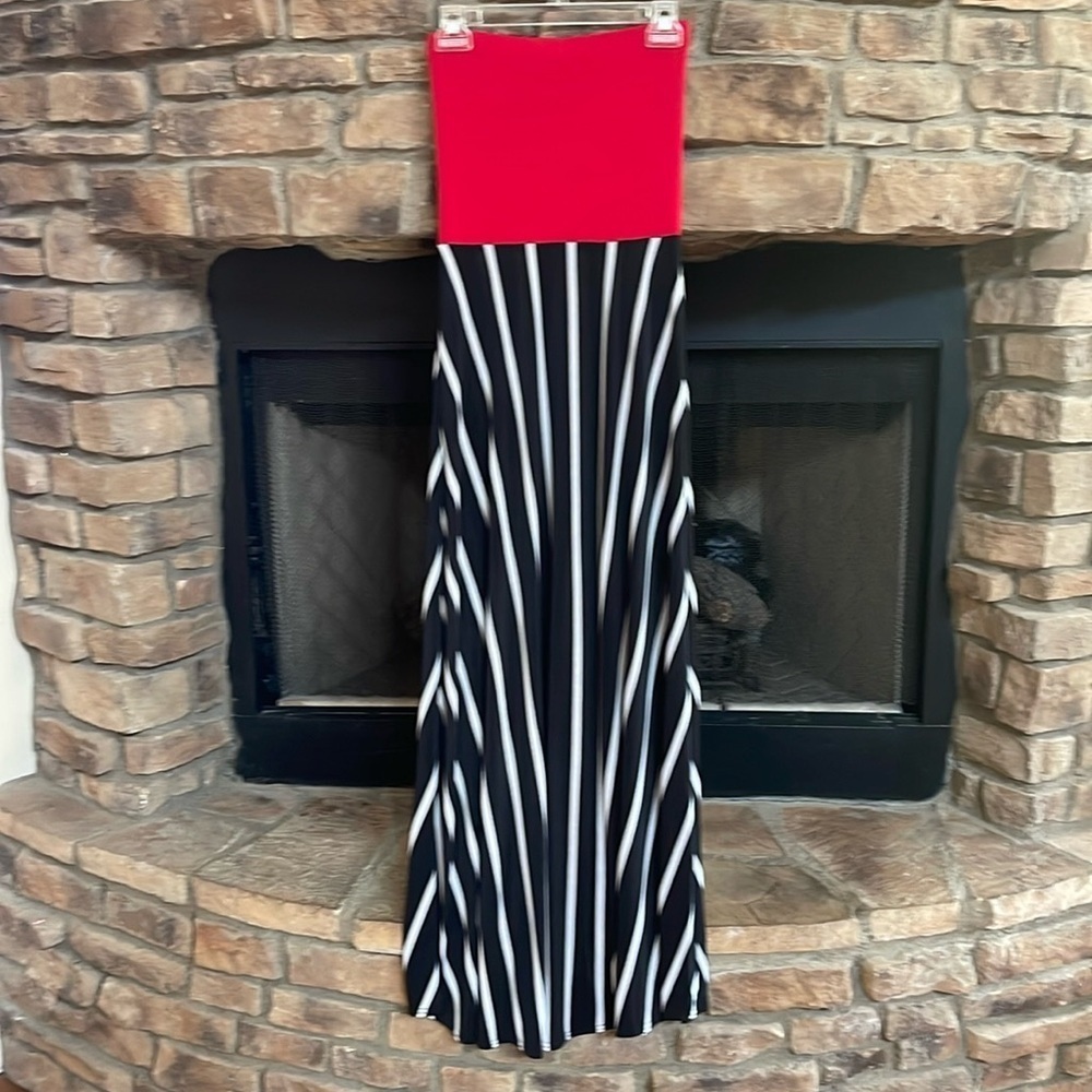 NWOT love…ady black and white striped maxi dress with red bodice. Size medium.